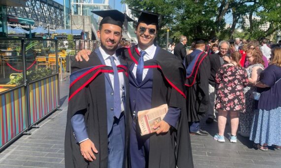 A picture of Jacques and Tarek at their graduation